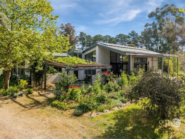 A Botanical Sanctuary on Approximately 8 Acres