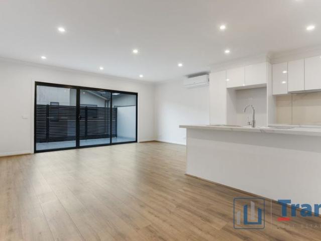 A BRAND NEW FOUR BEDROOM TOWNHOUSE