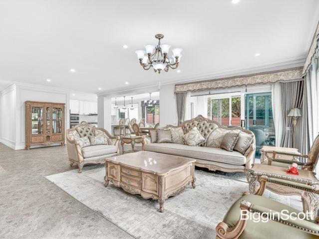A BREATHTAKING FAMILY HAVEN IN THE GWSC SCHOOL ZONE!