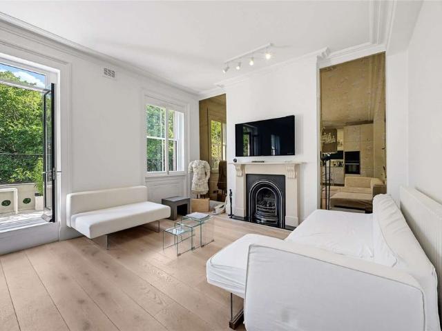 A bright third floor two bedroom apartment with lift, offering superb views over Ennismore Gardens in prime Knightsbridge