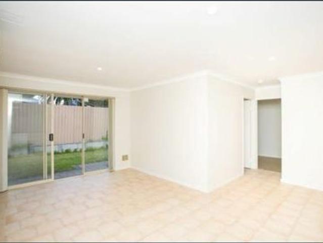 A Bright Three Bedroom Home with Its Own Courtyard