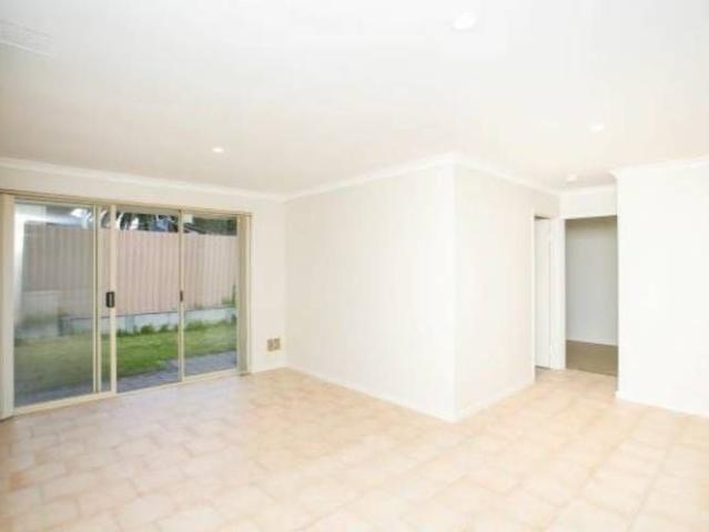 A Bright Three Bedroom Home with Its Own Courtyard