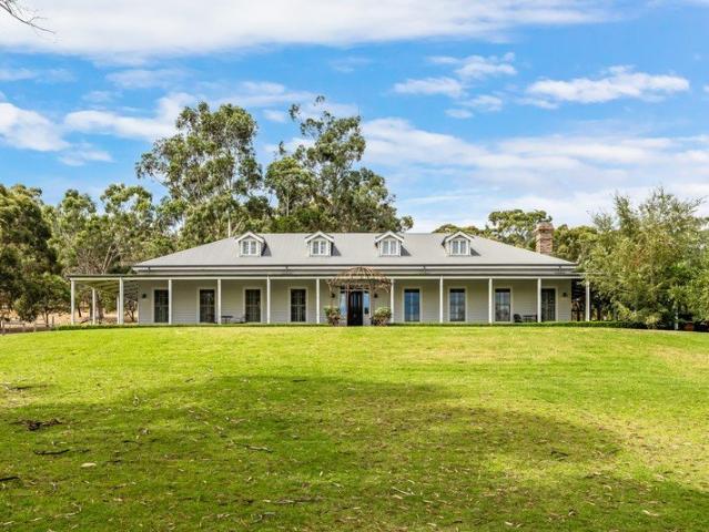 A C2012 homestead where refined elegance meets ten glorious acres of fresh country air