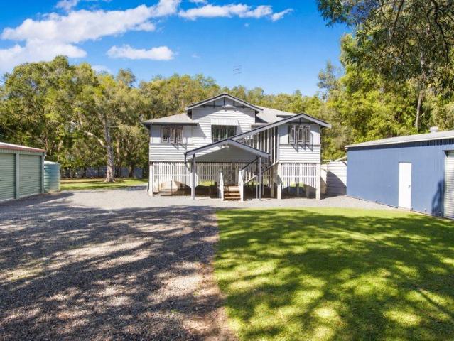 A Character Filled Queenslander Retreat on 1.43 Acres