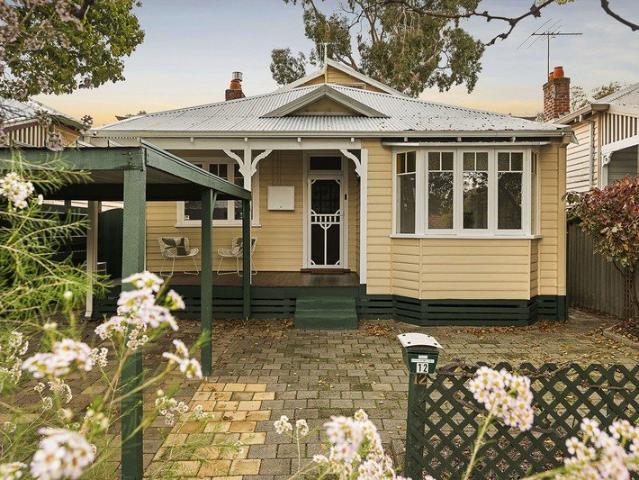 A Character Home with a Sunny North Facing Backyard