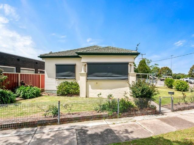 A Charming Opportunity with Space, Potential and Convenience