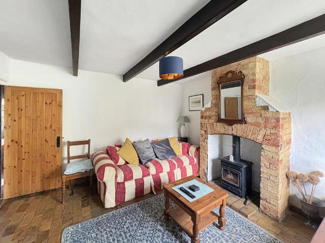 A charming and characterful three bedroom 1880s cottage, offering surprisingly generous accommodation arranged over two floors, with plenty of original style features throughout. The property is offered fully furnished with the main items of furnitur