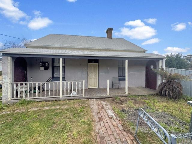 A CHARMING CHARACTER HOME ON A GENEROUS BLOCK