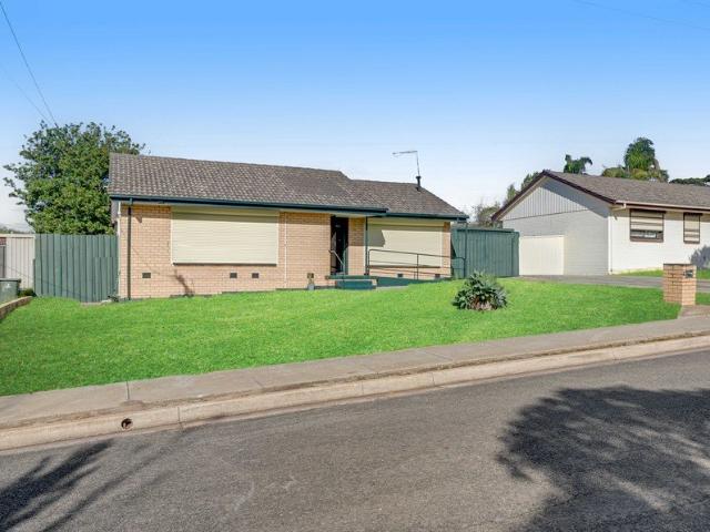 A Charming Family Home with Potentials!