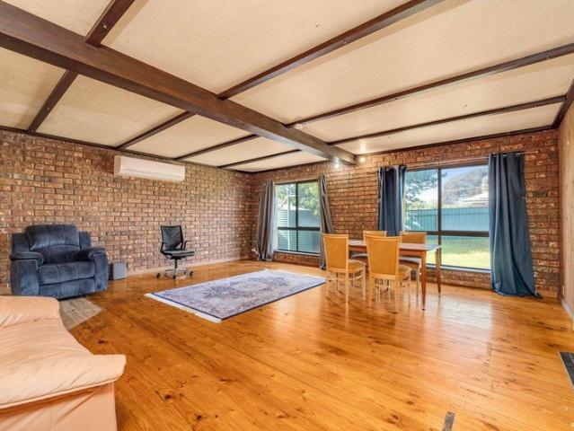 A Charming Family Home with Potentials!