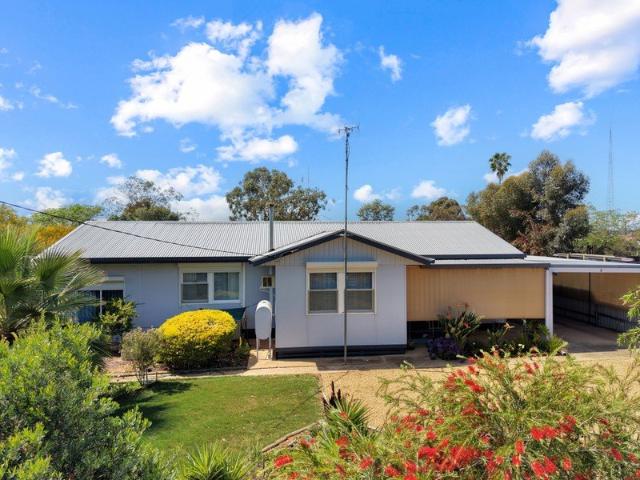 A Charming Family Home with Plenty of Potential!