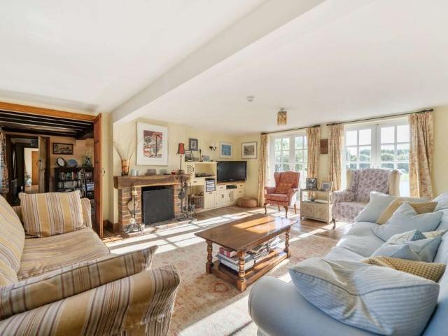 A charming five bedroom detached family home with a beautiful garden stunning countryside views