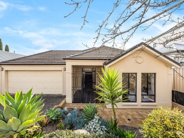 A charming home that spreads out over its easy care allotment within Craigburn's most hushed pocket
