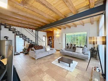 A charming renovated barn set in a green location