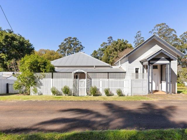 A Charming Village Landmark with History, Space & Potential