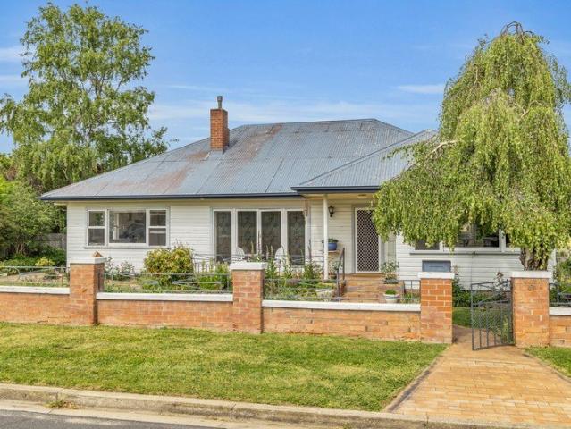 A Cherished Family Home on a Generous Block