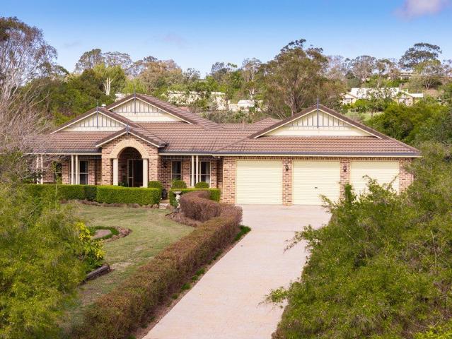 A Cherished Family Sanctuary on Over an Acre of Established Grounds