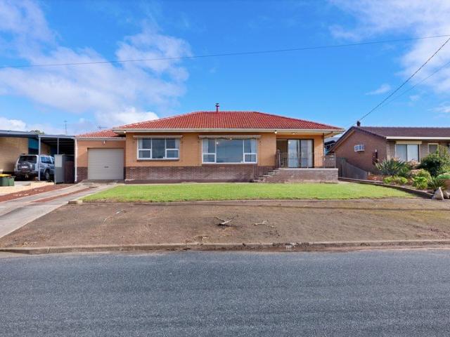 A classic brick home with endless potential.