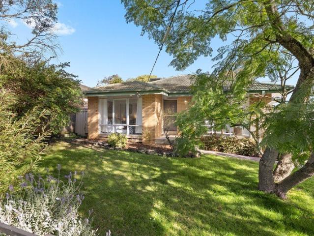 A Classic Family Home with a Backyard to Love