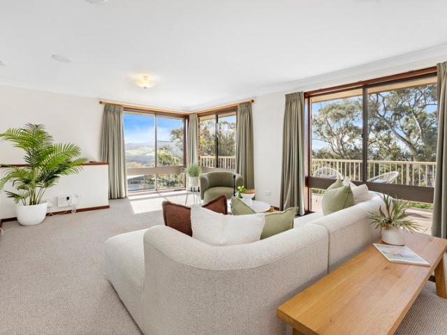 A Classic Home Holding an Elevated Position with Sweeping Vistas