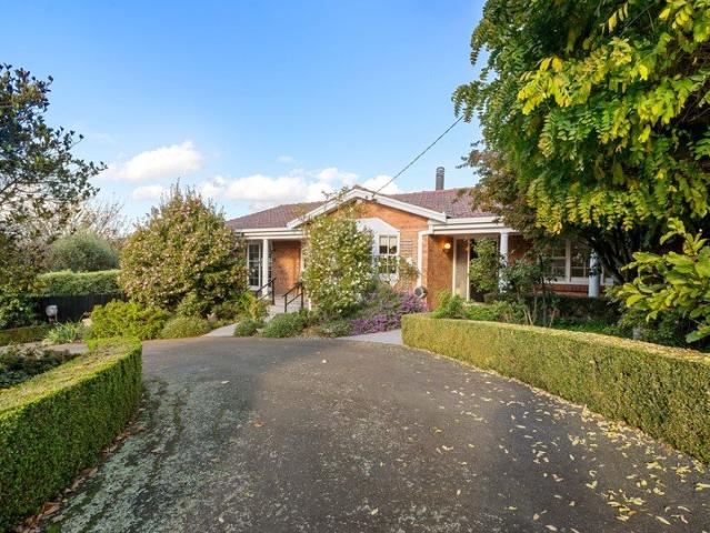 A Classic Home in a Lush Garden Setting