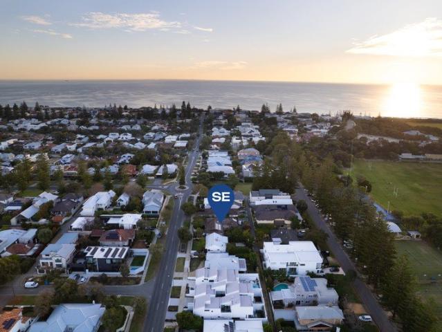 A Coastal Classic With Duplex Development Potential