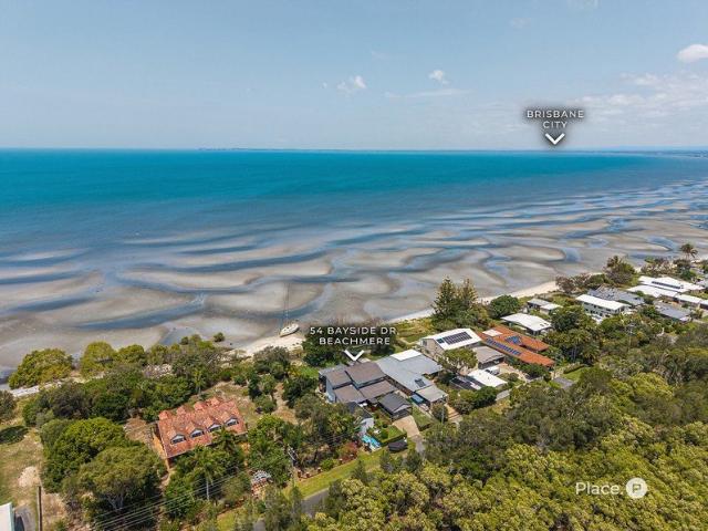 A Coastal Sanctuary of Space, Style & Serenity