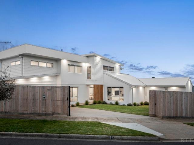 A Coastal Showpiece with Ocean Views on Both Levels