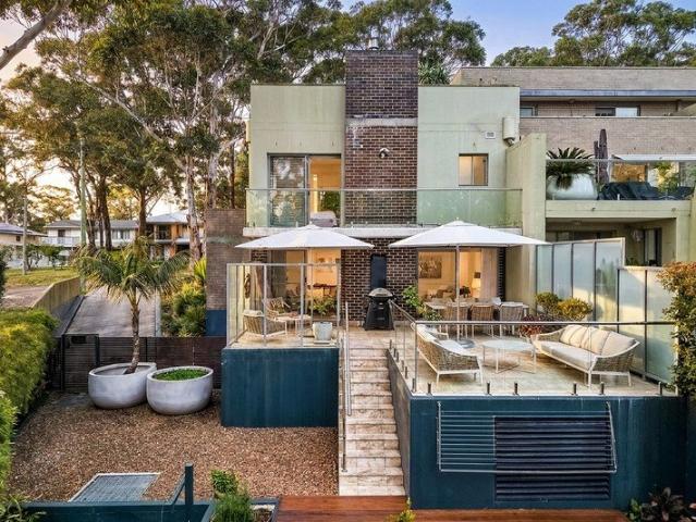 A COASTAL RETREAT, 607 METRES FROM THE SAND