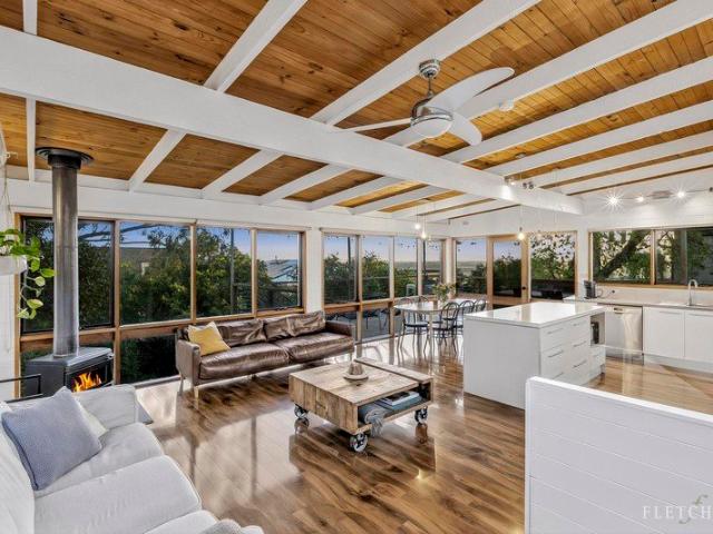 A Coastal Retreat with River Views and Income Appeal