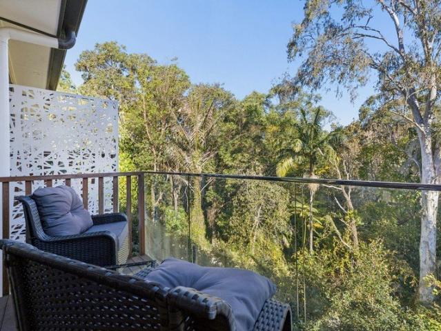 A Contemporary Tri Level Retreat Among the Trees