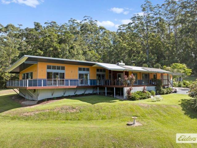 A Magnificent Home on 48 Acres with a creek!