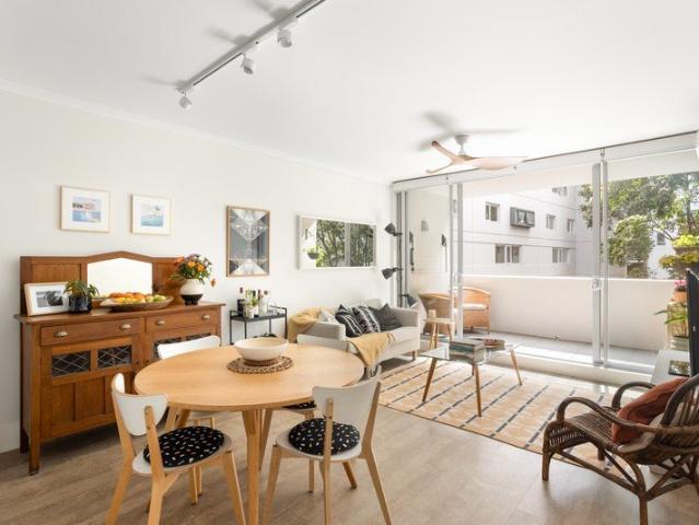 A contemporary split level apartment in a resort style complex