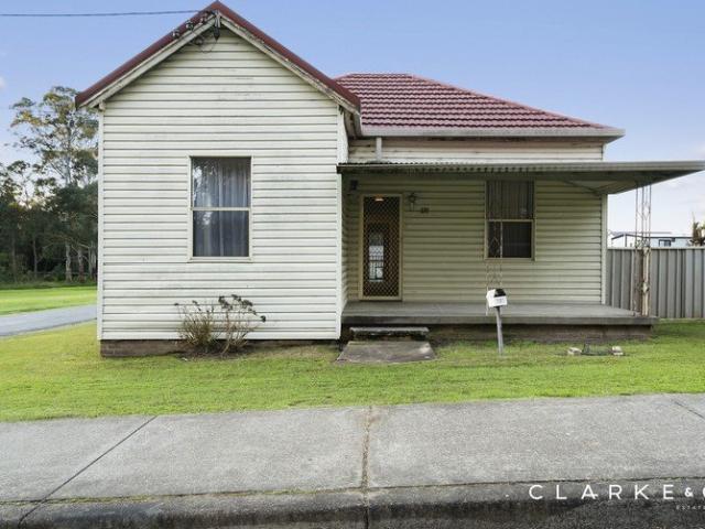 A CORNER BLOCK PACKED WITH POTENTIAL!
