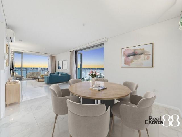 A Corner Residence of Distinction With Sweeping River and City Views!