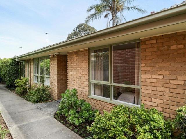 A courtyard, a car space and a great address