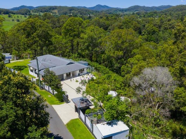 A Dual Living Private Retreat Set On Acreage Minutes from the Coast