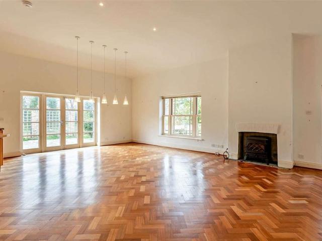 A detached home set in beautiful grounds