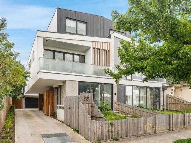 A Distinctive Near New Townhouse Defined by Detail and Design