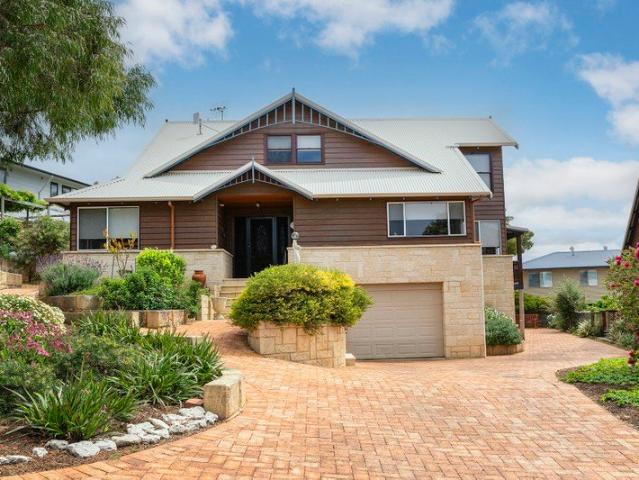 A Distinctive Home with Captivating Hardy Inlet Views