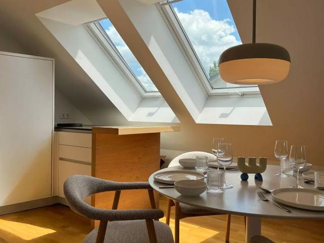 A fully furnished, exclusive penthouse combining serene living with excellent accessibility Munchen Amsterdam Apartments for Rent