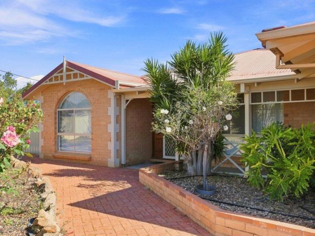 A Family Favourite with Stunning Gardens & a Big Shed