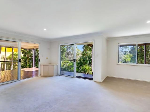 A Family Home Tucked Into the Treetops Space, light and total privacy, with nothing but green views from your own back deck in Pottsville