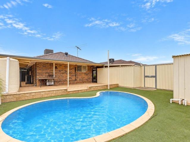 A Family Oasis with In Ground Pool and Great Outdoor Entertaining