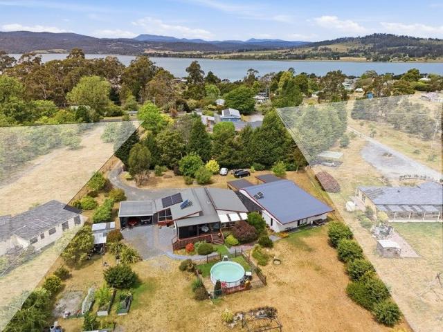 A Fantastic Modern Home on a Slice of Paradise with so much more!