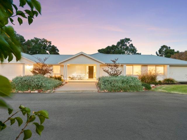 A Farm in Town Luxury Living on 5.6 Acres with Subdivision Potential