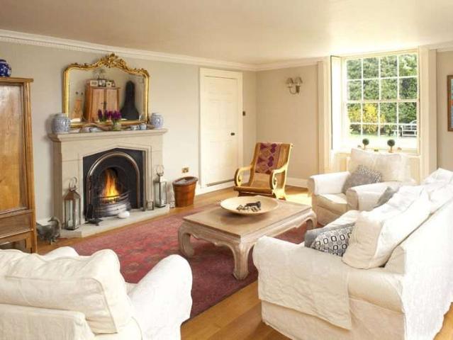 A fine and beautifully presented Grade II listed country home with excellent recreational facilities and outstanding panoramic views