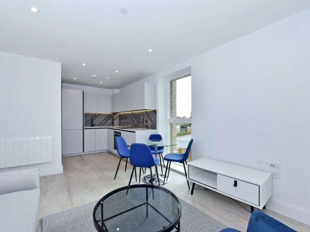 A first floor furnished apartment with south facing private balcony in the sought after Horlicks Artesian House development by Berkeley Homes
