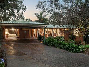 A Foothills Family Haven Where Pool, Parklands & Privacy Converge