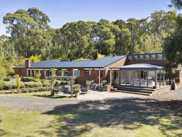 A Forest Edge Lifestyle Retreat with Lake & Boathouse Charm